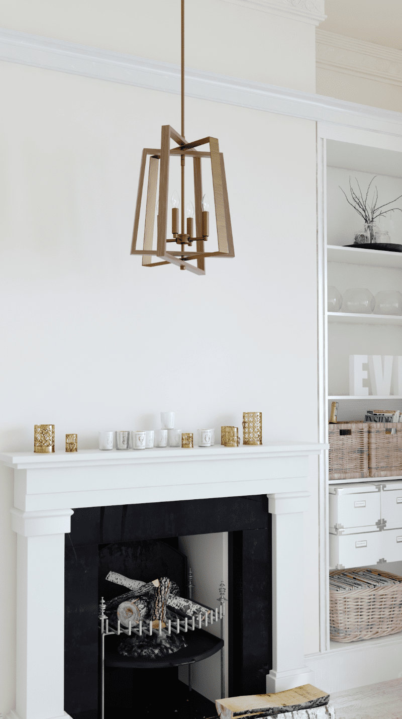 Pendant light hangs over fireplace